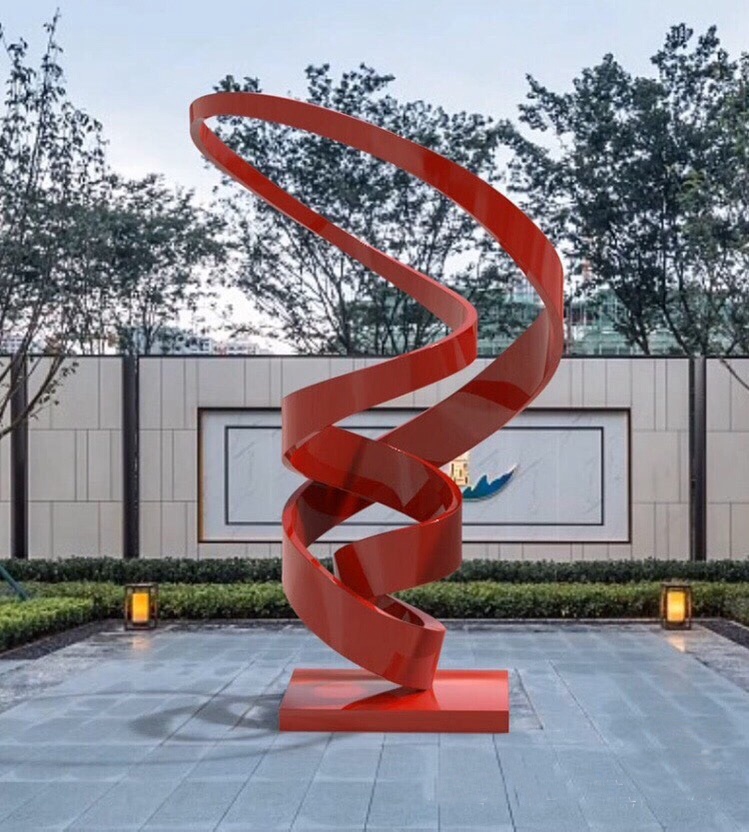 red stainless steel modern sculpture